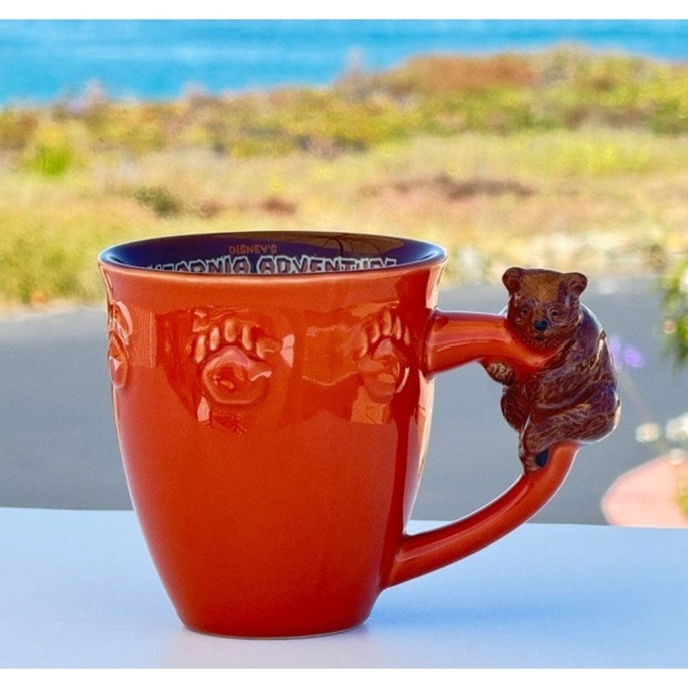 Disney California Adventure Grizzly Bear Handle Mug Orange Embossed Paw Coffee